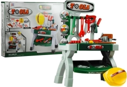 Children’s workbench with tools and helmet