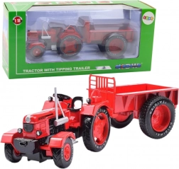 Kovinski rdeči traktor s prikolico 1:18