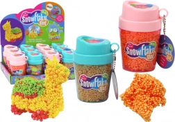 Squishy orange polystyrenkugler i bæger