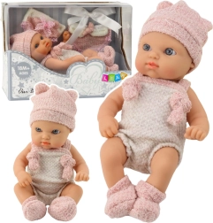Poupée bébé 18 cm en tenue rose avec bonnet et bavoir