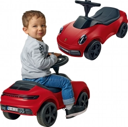 Rdeči poganjalec Porsche 911 s hupo in tihimi kolesi BIG