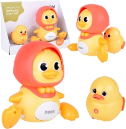 Interaktivna račja družinica – gibljiva glasbena igrača za spodbujanje plazenja