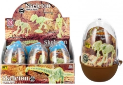 Glowing dinosaur skeleton in a plastic egg – collectible building set