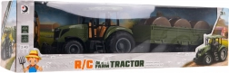 Zeleni daljinsko vodeni traktor s prikolico