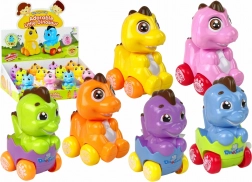 Wind-up dinosaur in an egg on wheels