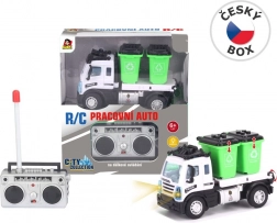 Afvalwagen op afstandsbediening met containers