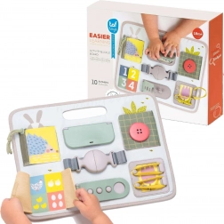 Tavola attiva con fibbie TAF TOYS per lo sviluppo della motricità fine