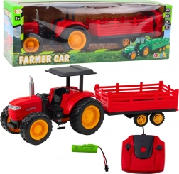 Remotely controlled farm tractor with trailer red