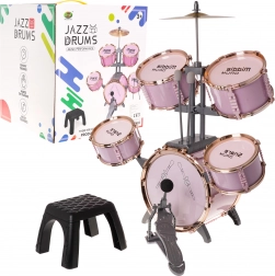 Pink children's drum kit with 5 drums and a stool