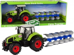 Traktor s plugom na vztrajnik