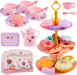 Children’s tea and coffee set with teapot and cookies