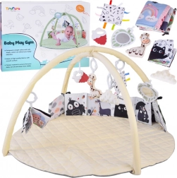 Pædagogisk legetæppe med buer og ophængslegetøj