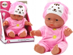 Petite poupée bébé en tenue rose avec bonnet de lapin