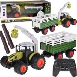 Remote-controlled tractor with trailer and log grapple
