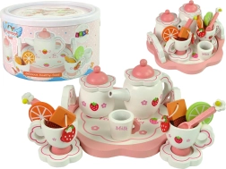 Wooden pink tea set with flowers and strawberries