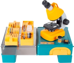 Microscope avec accessoires dans une mallette