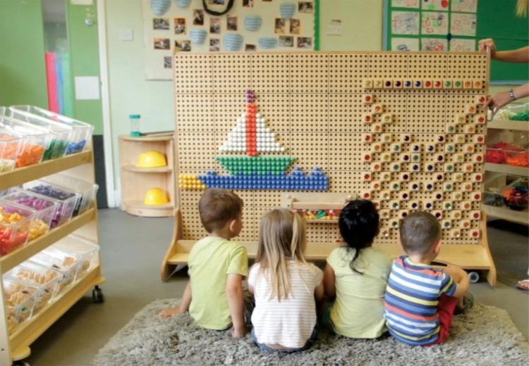 Giant perforated work surface for unlimited creation
