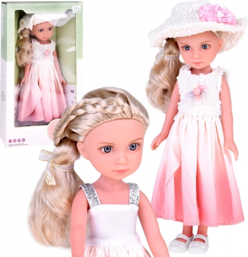 Elegancka stylowa lalka z kapeluszem i długimi blond włosami