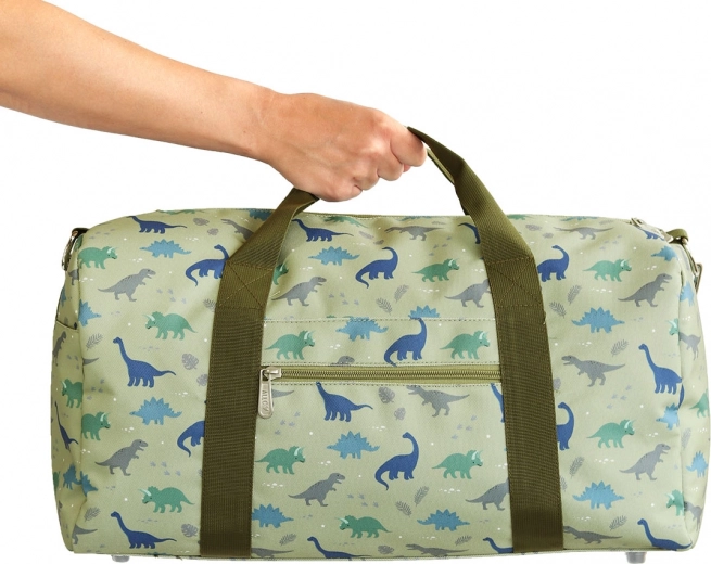 A Little Lovely Company kids' travel bag with dinosaurs