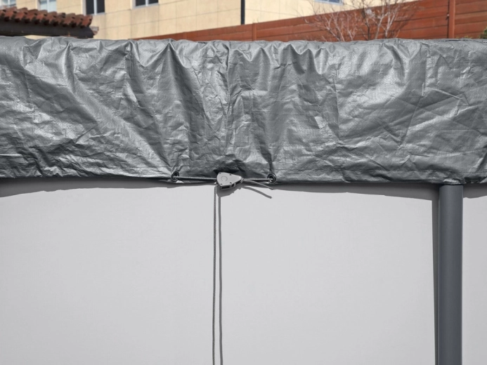 Wind-resistant drawstring system