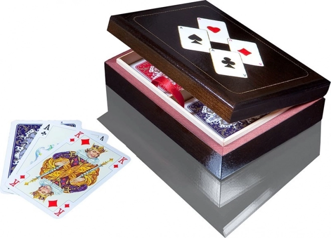 Luxury cards in a wooden jewelry box with aces