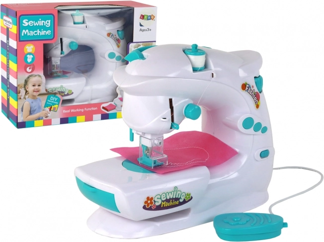 Kids’ sewing machine like a real one, white, battery-powered