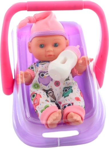 Steklenička in prikupna oblačila z vzorcem sove