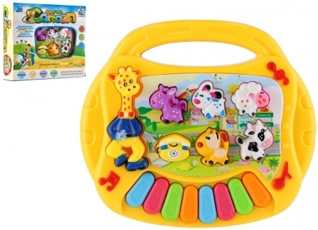 Pianko živalice plast 17 cm Angleško govoreče na baterije z zvokom, svetlobo v škatlici 19 x 16,5 x 5 cm