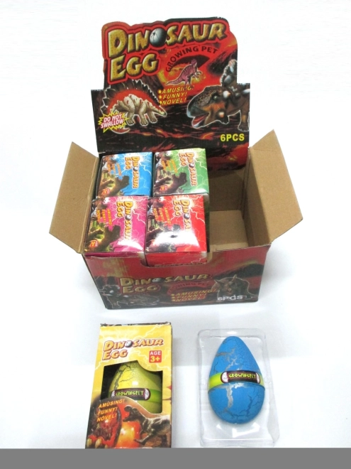 Jajce z rastočim dinozavrom 12 × 8 cm