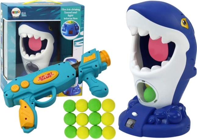 Dexterity game with shark shooting and balls