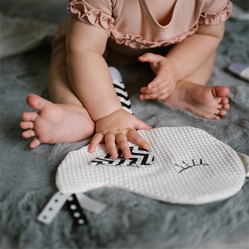 Sound, textures, and tags for fine motor skills