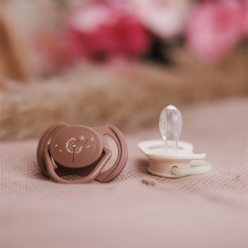 Soft symmetrical silicone teat