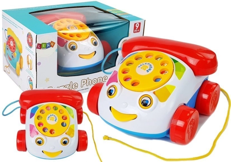 Children's pull-along telephone with battery-powered handset