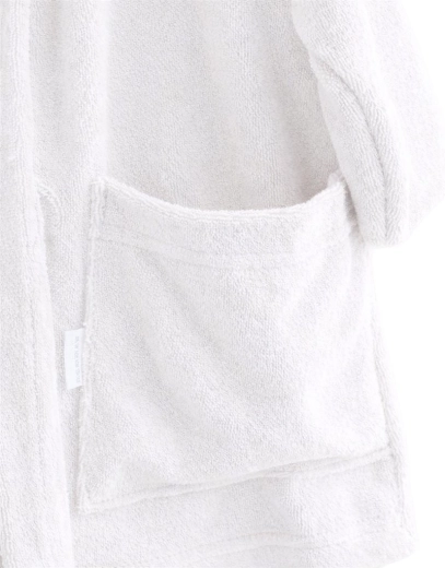 Ceinture cousue et poches plus profondes