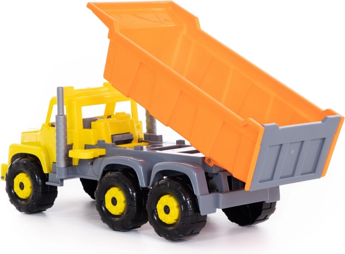 Tilting bed with openable tailgate