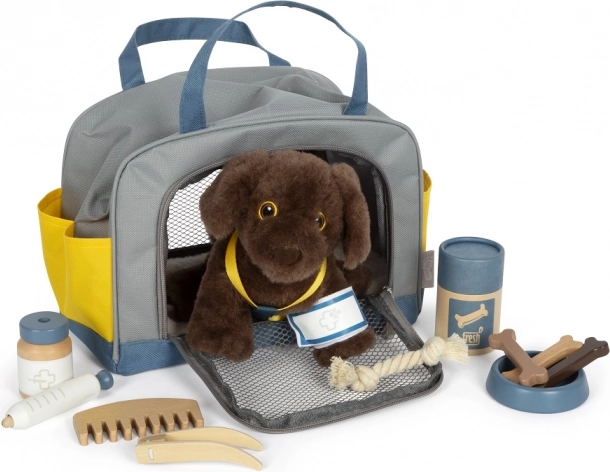 Chien en peluche avec ensemble de soins de Small Foot