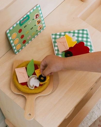 Authentic pizza on a wooden peel