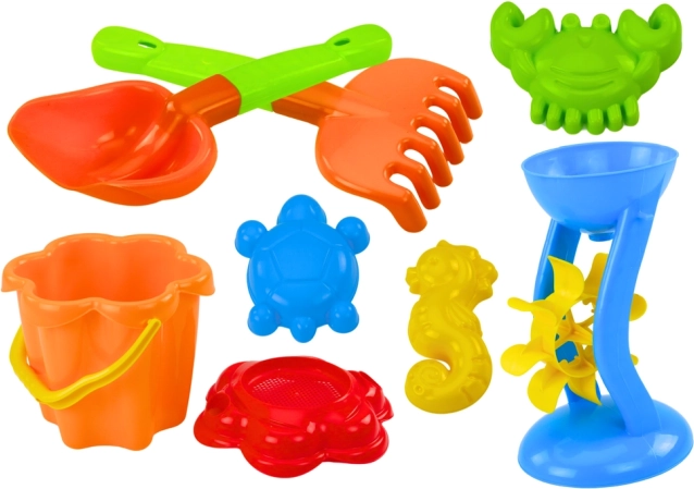 Ensemble coloré de jouets de sable avec moulin et moules