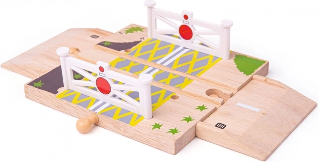 Træjernbanekrydsning med porte til træbaner