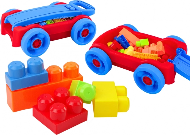 Set de cubes pour enfants dans un chariot à roulettes bleu‑rouge