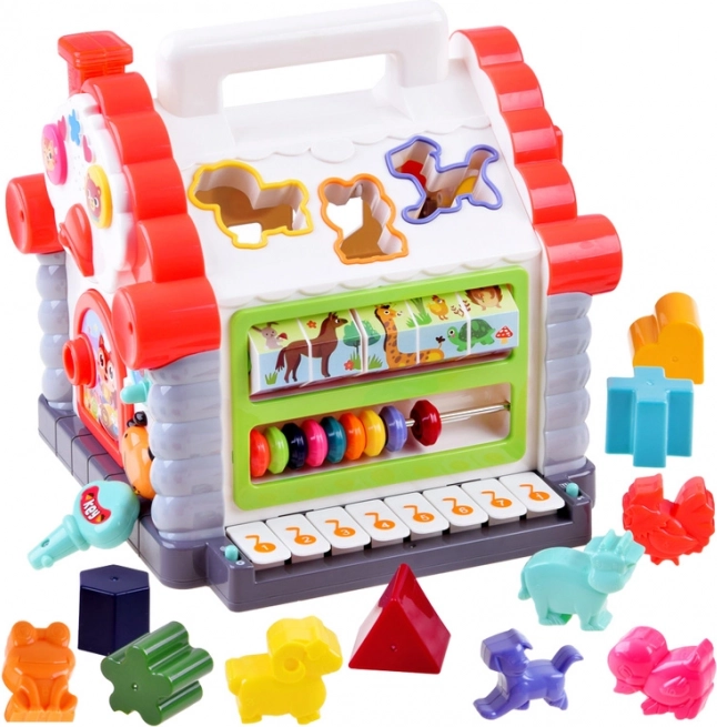 Interaktywny domek – muzyczne sortowanie kształtów i zwierzątek dla dzieci 18+ miesięcy