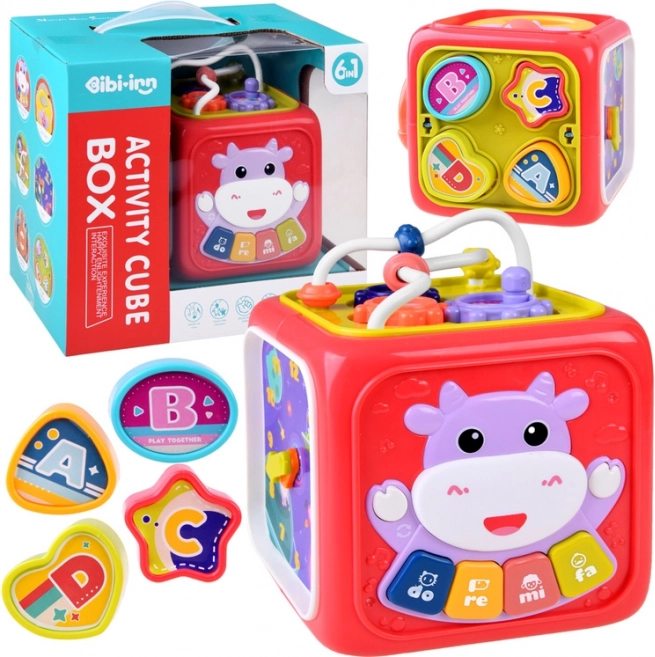 interaktivní edukační kostka s pianem, labyrintem a sorterem