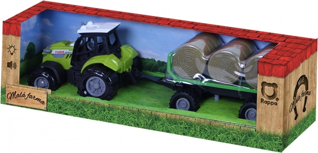 Traktor sa zvukom i svjetlom s prikolicom i balama slame