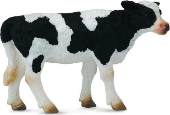 Plastic figurine of a Friesian calf