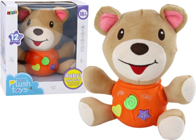 Interactive plush teddy bear – orange, plays and talks, 23 cm