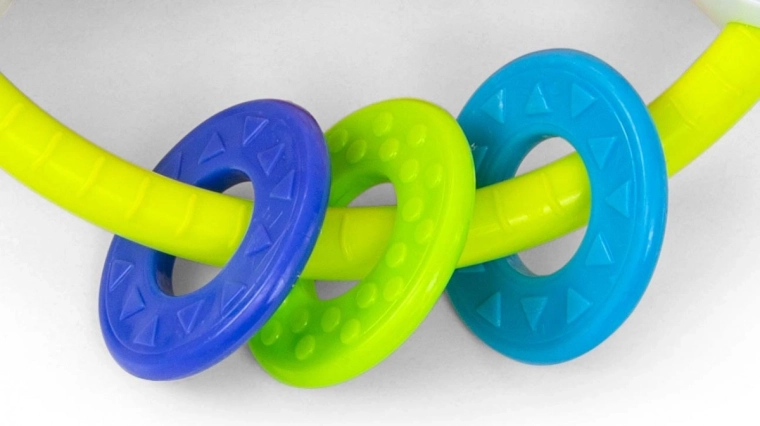 Integrované kousátko pro úlevu dásním