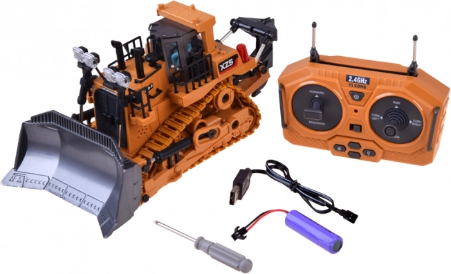 RC buldozer s pohyblivou radlicí na dálkové ovládání