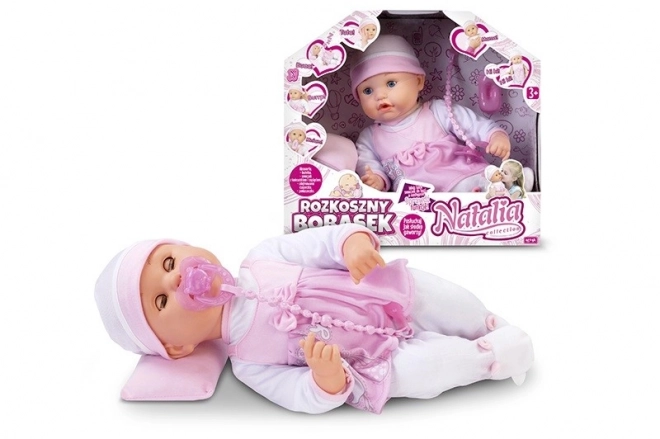 Interactive baby doll with accessories