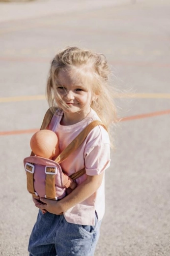 Sikker fastgørelse af dukken