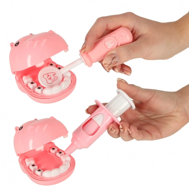 Pink hippo dentist playset